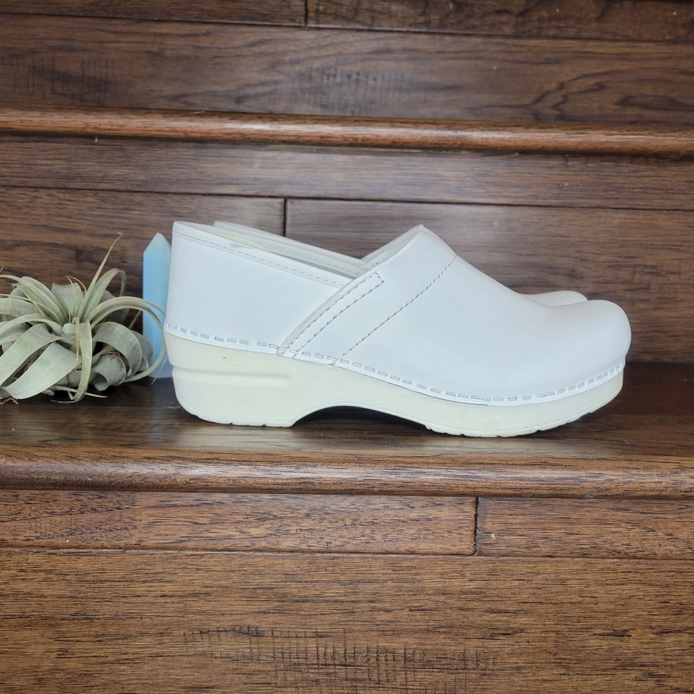 Dansko white leather slip on clogs